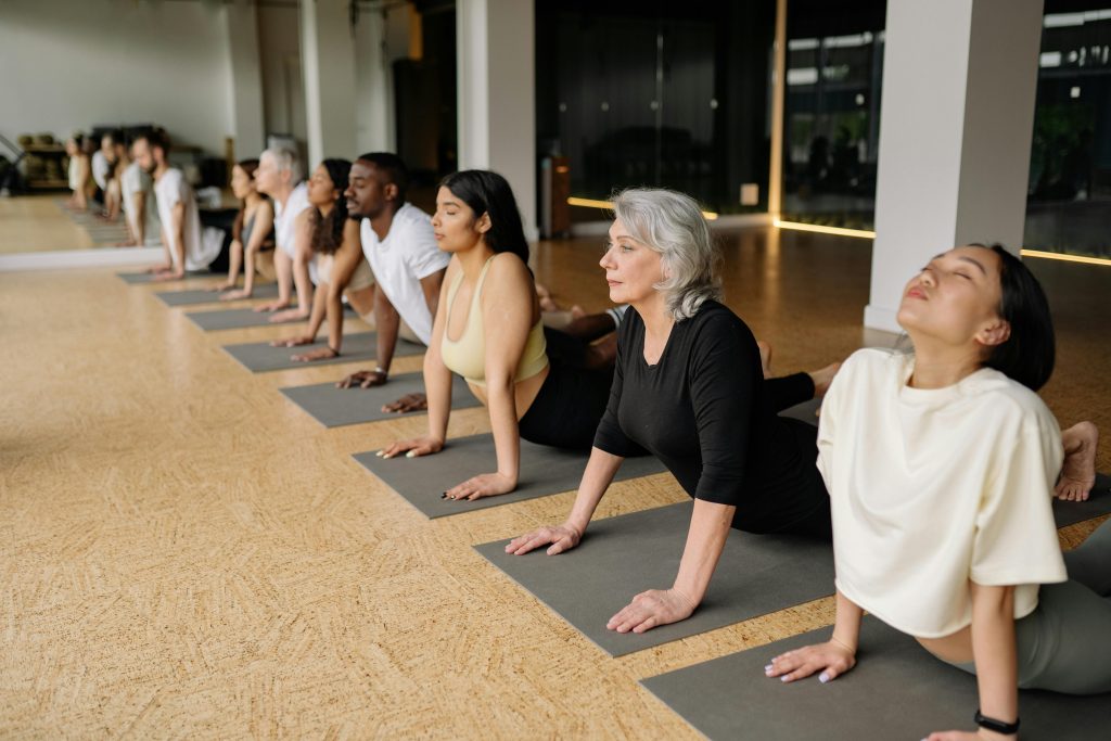 people stretching as health challenges for employees
