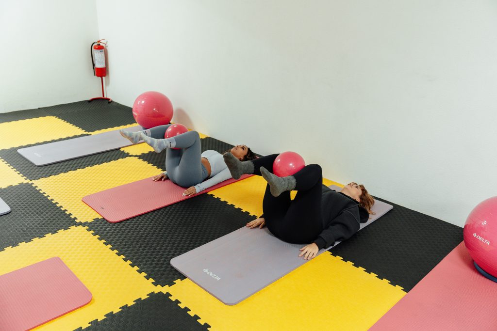 two women participating in a corporate wellness program